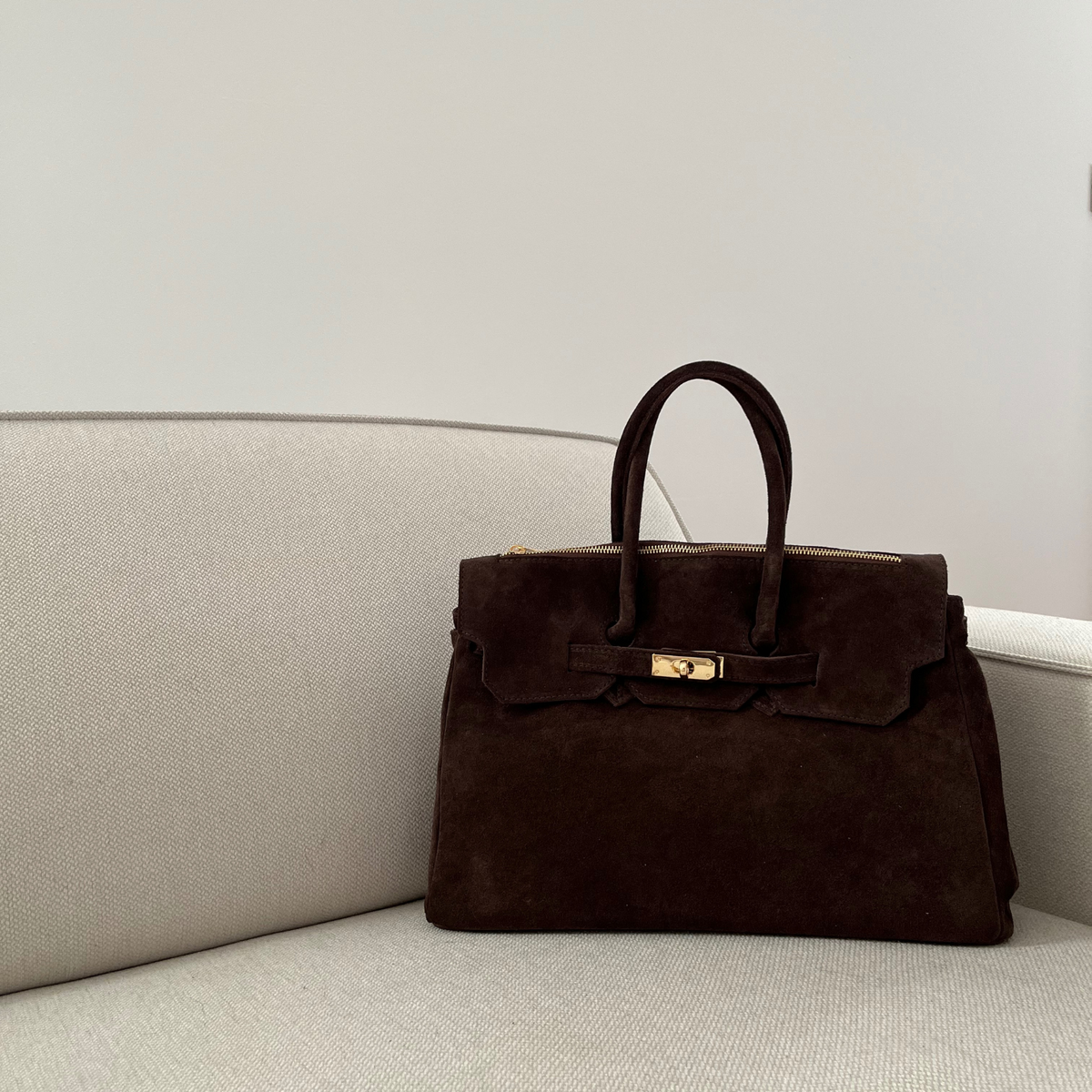 Sac a main en daim fabrique en Italie 