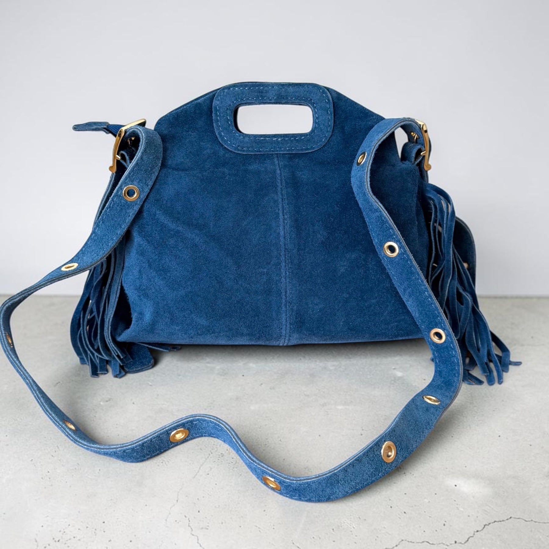 Sac a bandouliere bleu a franges en daim fabrique en Italie 
