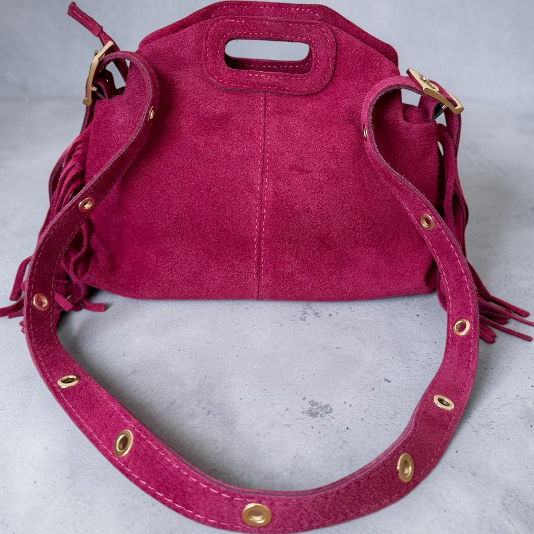 Sac a bandouliere rose fuchsia a franges en daim fabrique en Italie 